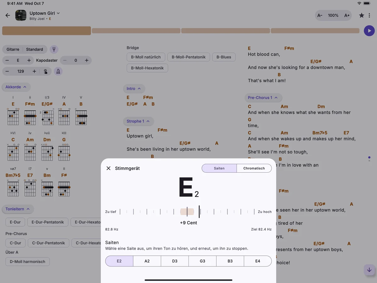 Ein Song auf einem iPad mit geöffnetem Stimmgerät darüber, die tiefe E-Saite einer Gitarre 9 Cent zu hoch.