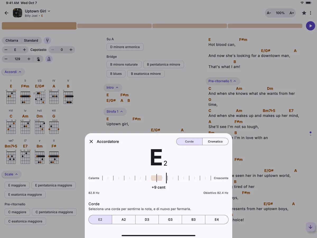 Una canzone su un iPad con sopra l’accordatore, che sente la corda E grave di una chitarra crescente di 9 cent.